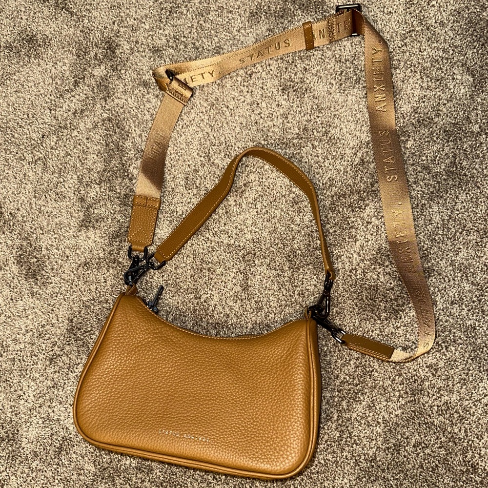Status Anxiety look both ways bag. Camel.